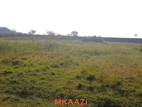 5-acre industrial-zoned land for sale in Thika Municipality with ready title deed, flat terrain, and easy access to major roads and utilities.