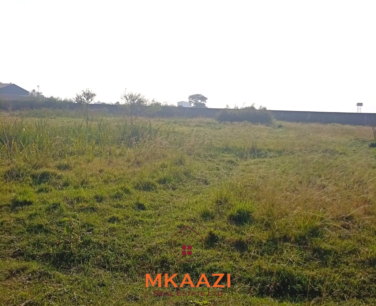 5-acre industrial-zoned land for sale in Thika Municipality with ready title deed, flat terrain, and easy access to major roads and utilities.