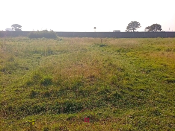 5-acre industrial-zoned land for sale in Thika Municipality with ready title deed, flat terrain, and easy access to major roads and utilities.