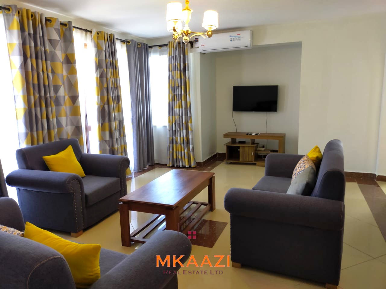 Fully furnished 2-bedroom apartment for rent near City Mall, Nyali with swimming pool, lift, Wi-Fi, AC, and 24-hour security.