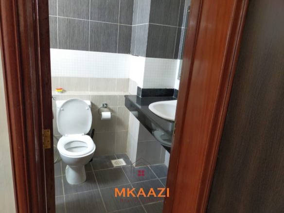 Fully furnished 2-bedroom apartment for rent near City Mall, Nyali with swimming pool, lift, Wi-Fi, AC, and 24-hour security.