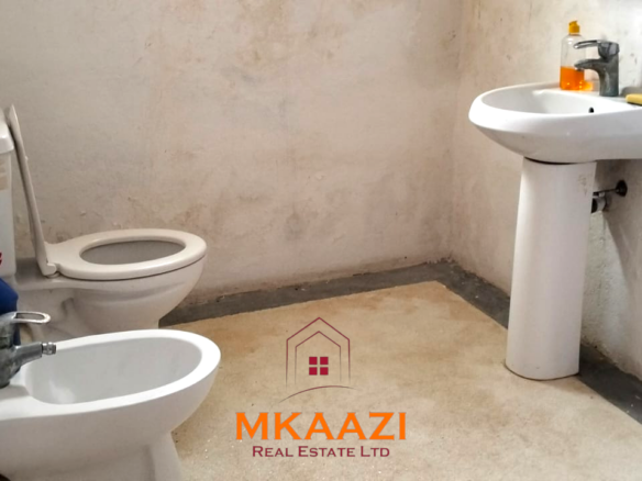 Elegant 4-bedroom all en-suite luxury villa with private swimming pool, landscaped one-acre garden, guest rooms, and entertainment area on Lamu Road, Malindi.