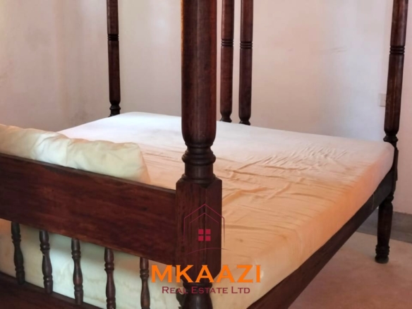 Elegant 4-bedroom all en-suite luxury villa with private swimming pool, landscaped one-acre garden, guest rooms, and entertainment area on Lamu Road, Malindi.