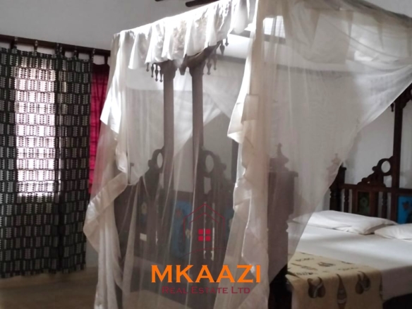 Elegant 4-bedroom all en-suite luxury villa with private swimming pool, landscaped one-acre garden, guest rooms, and entertainment area on Lamu Road, Malindi.