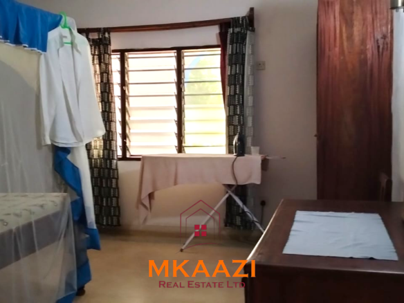 Elegant 4-bedroom all en-suite luxury villa with private swimming pool, landscaped one-acre garden, guest rooms, and entertainment area on Lamu Road, Malindi.