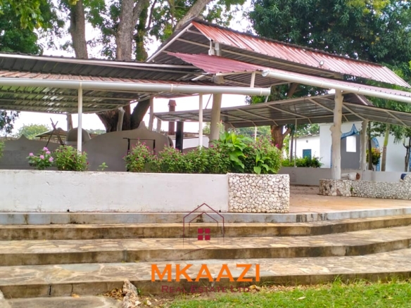 Elegant 4-bedroom all en-suite luxury villa with private swimming pool, landscaped one-acre garden, guest rooms, and entertainment area on Lamu Road, Malindi.