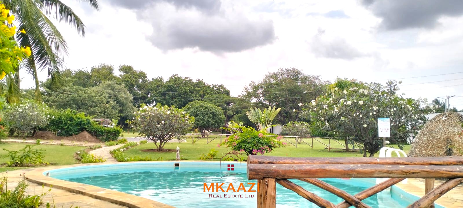 2-bedroom all en-suite Swahili villa with makuti roof, shared swimming pool, and landscaped gardens for sale on Lamu Road, Malindi.
