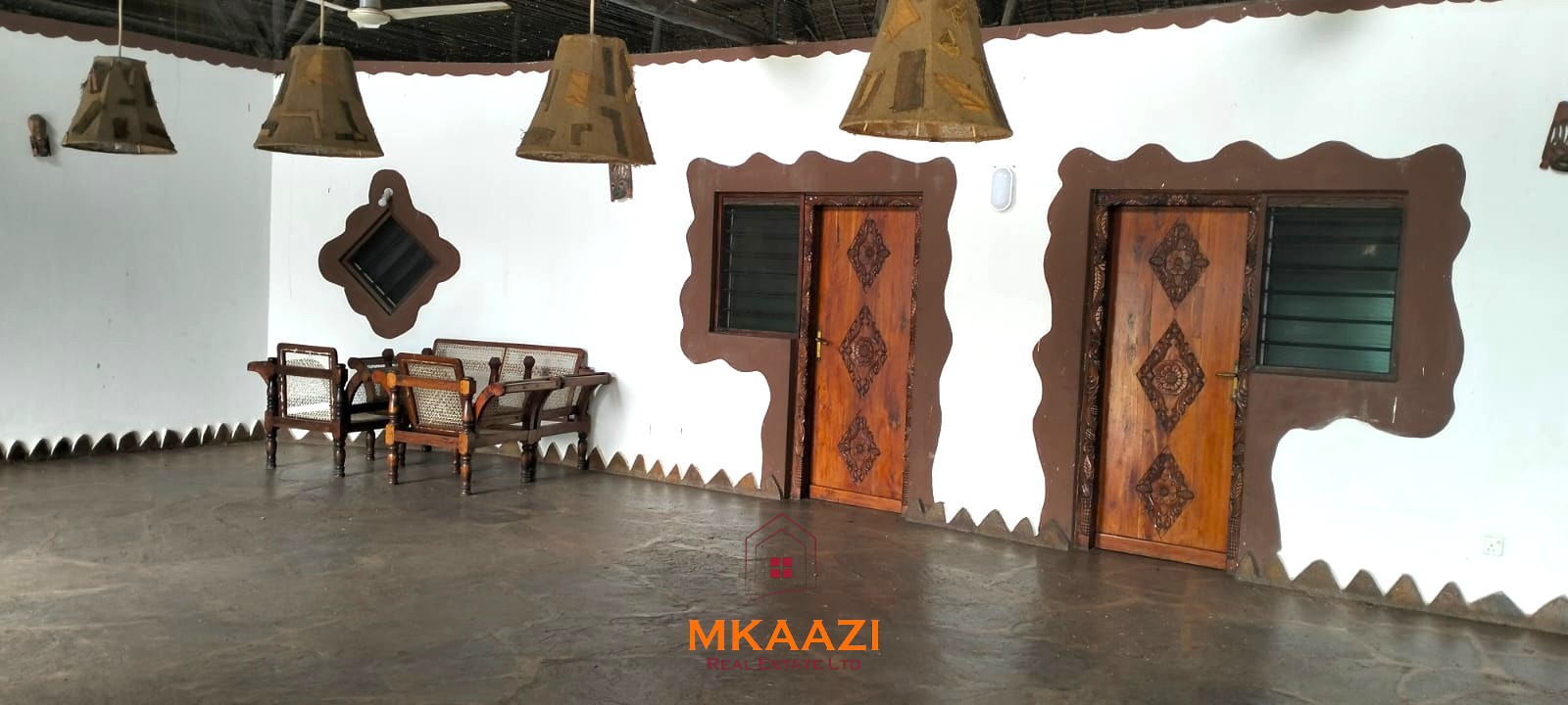 2-bedroom all en-suite Swahili villa with makuti roof, shared swimming pool, and landscaped gardens for sale on Lamu Road, Malindi.