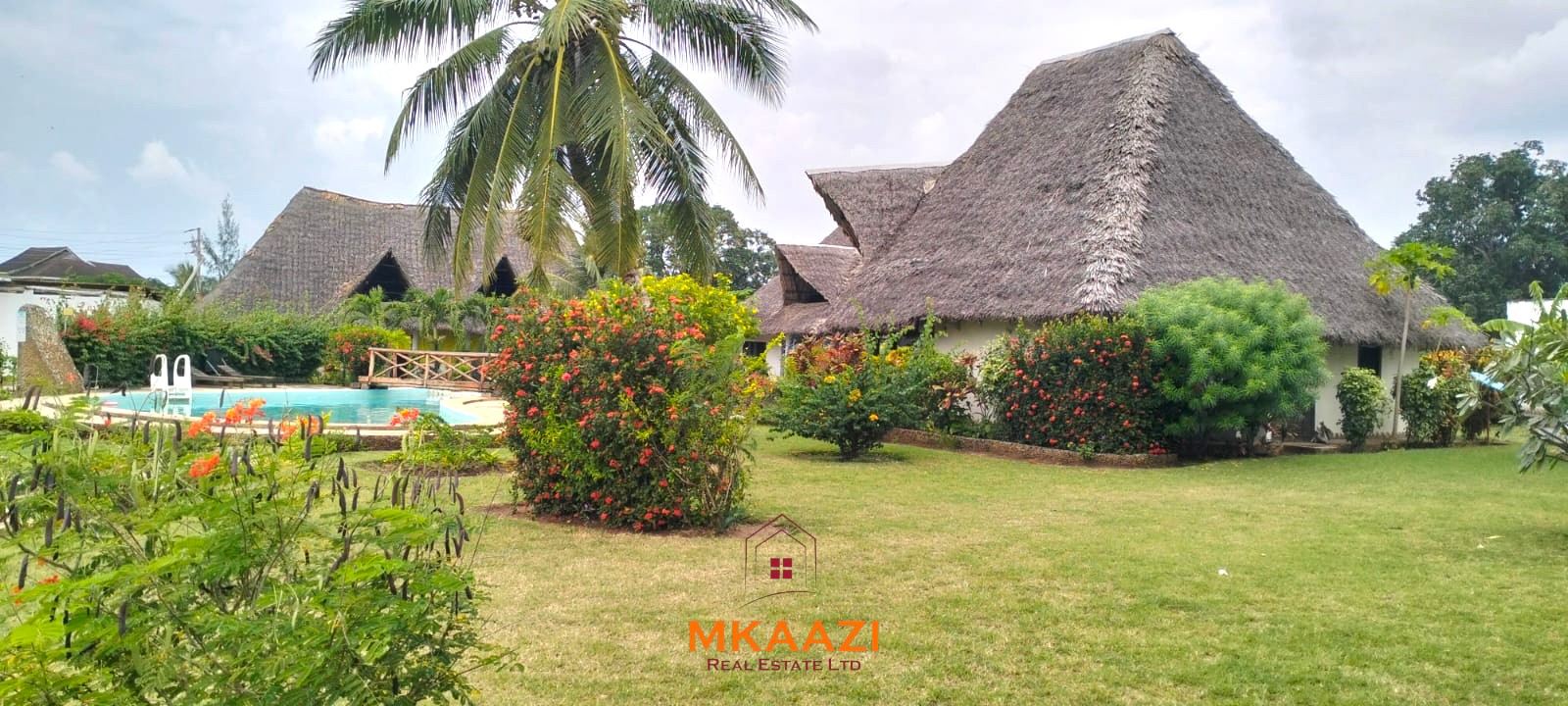 2-bedroom all en-suite Swahili villa with makuti roof, shared swimming pool, and landscaped gardens for sale on Lamu Road, Malindi.