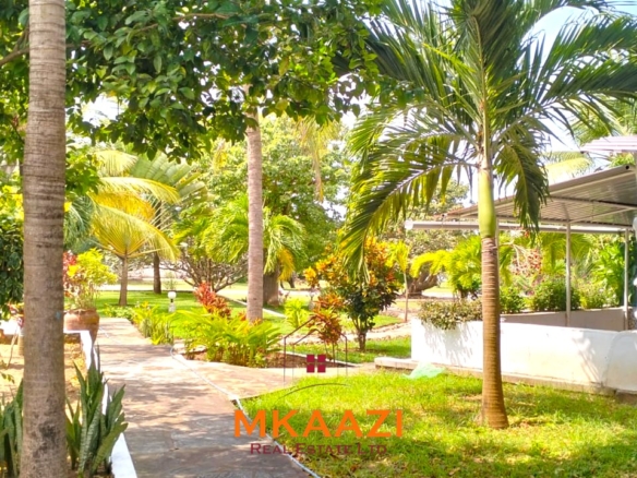Elegant 4-bedroom all en-suite luxury villa with private swimming pool, landscaped one-acre garden, guest rooms, and entertainment area on Lamu Road, Malindi.