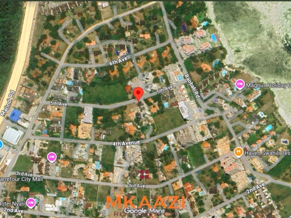 Fully furnished 2-bedroom apartment for rent near City Mall, Nyali with swimming pool, lift, Wi-Fi, AC, and 24-hour security.