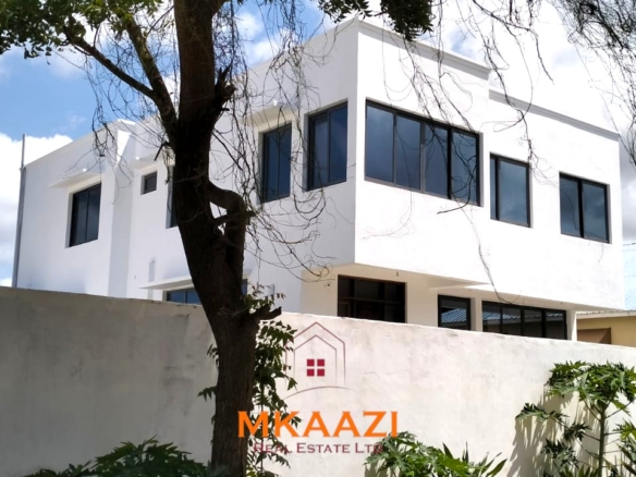 Luxury 4-bedroom villa for sale in Carolina Residence on Casuarina Road, Malindi with solar backup, swimming pool, gazebo, and ready for immediate occupancy.