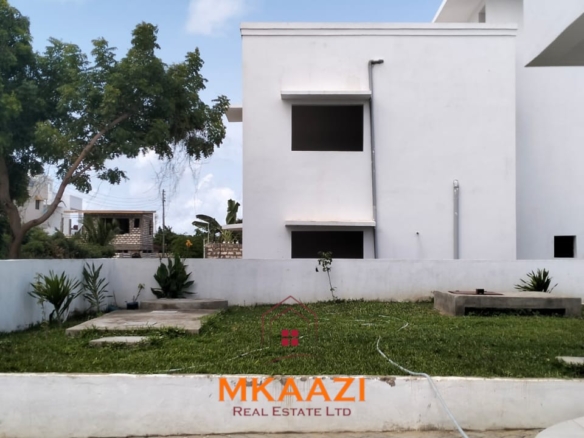 Luxury 4-bedroom villa for sale in Carolina Residence on Casuarina Road, Malindi with solar backup, swimming pool, gazebo, and ready for immediate occupancy.