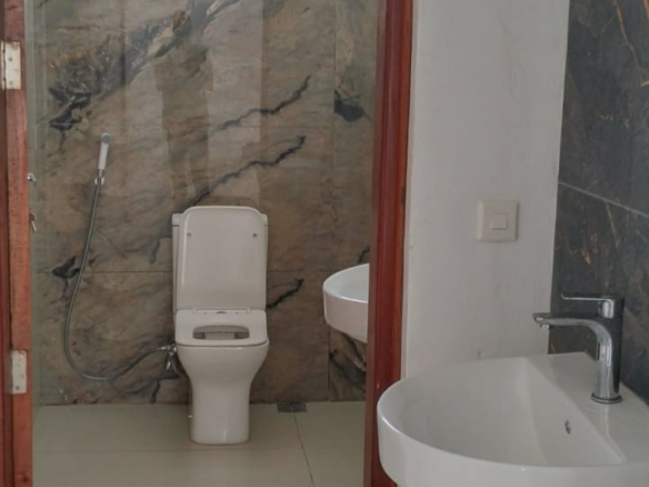 Luxury 4-bedroom villa for sale in Carolina Residence on Casuarina Road, Malindi with solar backup, swimming pool, gazebo, and ready for immediate occupancy.