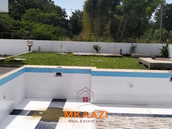Luxury 4-bedroom villa for sale in Carolina Residence on Casuarina Road, Malindi with solar backup, swimming pool, gazebo, and ready for immediate occupancy.