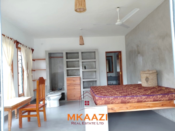 Fully furnished 3-bedroom all-ensuite villa with swimming pool, staff house, borehole, and landscaped garden for sale in Fragola, Watamu.