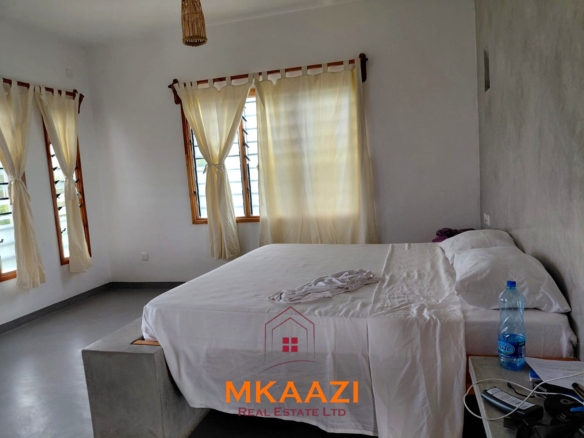 Fully furnished 3-bedroom all-ensuite villa with swimming pool, staff house, borehole, and landscaped garden for sale in Fragola, Watamu.