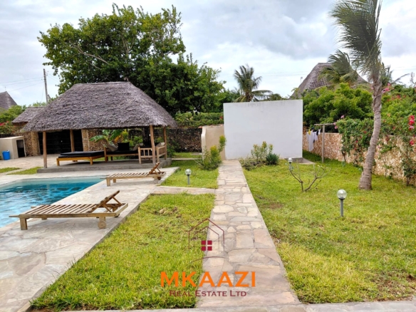 Fully furnished 3-bedroom all-ensuite villa with swimming pool, staff house, borehole, and landscaped garden for sale in Fragola, Watamu.