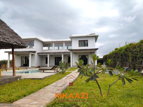 Fully furnished 3-bedroom all-ensuite villa with swimming pool, staff house, borehole, and landscaped garden for sale in Fragola, Watamu.