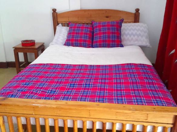 Fully furnished lodge to let in Laikipia near Ol Pejeta Conservancy featuring six ensuite rooms, restaurant, gardens, camping facilities, and modern amenities.