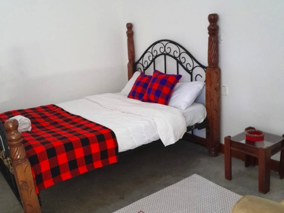 Fully furnished lodge to let in Laikipia near Ol Pejeta Conservancy featuring six ensuite rooms, restaurant, gardens, camping facilities, and modern amenities.