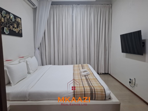 Luxury 3-bedroom beachfront villa for short-term rental in Kuruwitu, Vipingo with ocean views, private beach access, shared swimming pool, and modern interiors.