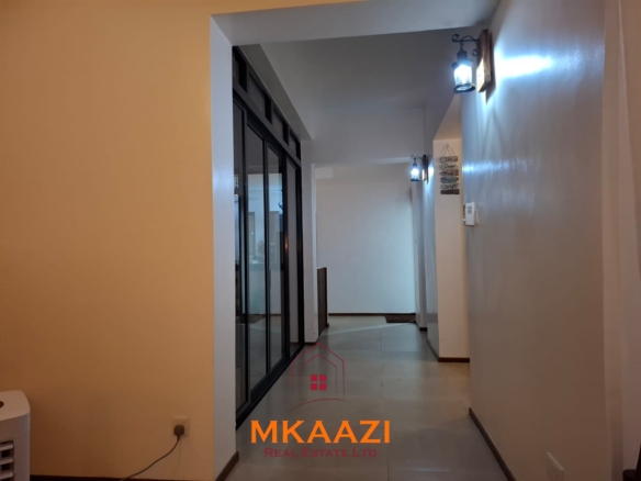 Luxury 3-bedroom beachfront villa for short-term rental in Kuruwitu, Vipingo with ocean views, private beach access, shared swimming pool, and modern interiors.
