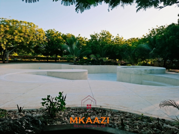 Luxury 3-bedroom beachfront villa for short-term rental in Kuruwitu, Vipingo with ocean views, private beach access, shared swimming pool, and modern interiors.