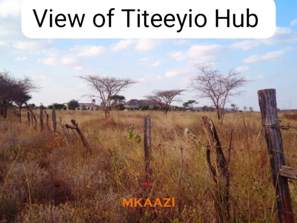 50×100 plots for sale at 10514 Titeeyio Hub along Emai–Loitoktok Road, 2km from Duka Moja. Ready title deeds, highway access and utilities underway.