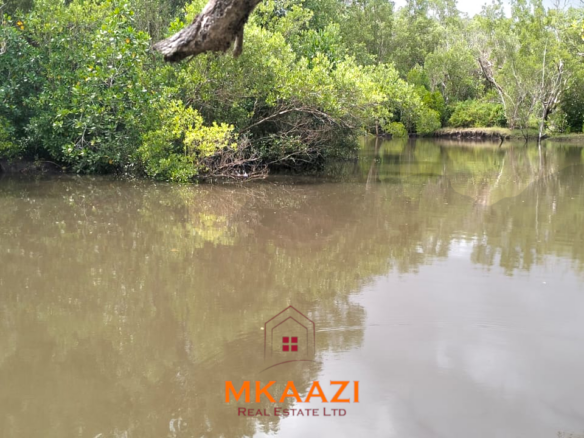 26,000 acres of prime land for sale in Lamu County, touching the LAPSET road connecting Lamu Port to Garissa, with a creek and mature mangrove forest. Asking KSh 230,000 per acre.