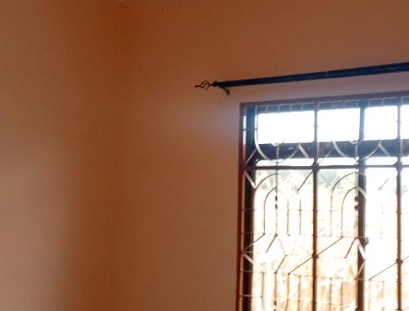 3-acre developed farm for sale in Kimashuku Mnadani, Moshi, Tanzania, featuring a farmhouse, 140-metre borehole, greenhouse, 200 apple trees, fruit trees and 5,000-litre water tank.