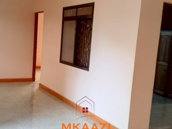 3-acre developed farm for sale in Kimashuku Mnadani, Moshi, Tanzania, featuring a farmhouse, 140-metre borehole, greenhouse, 200 apple trees, fruit trees and 5,000-litre water tank.