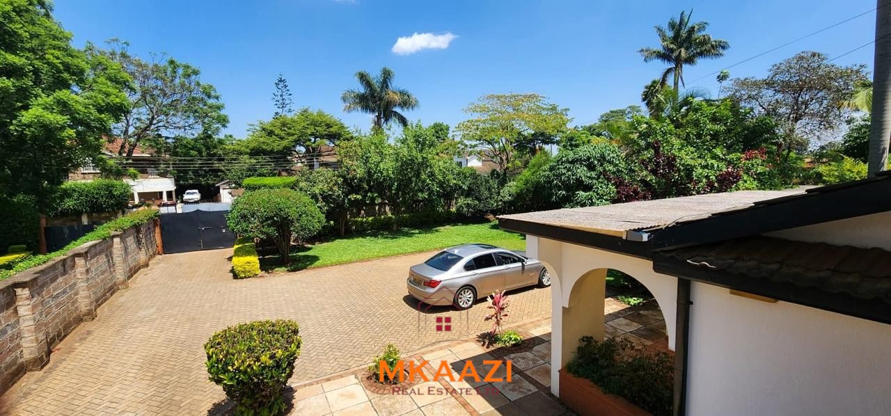 5 Bedroom Home for Sale in Mountain View Nairobi Spacious five-bedroom family home for sale on approximately a quarter acre in Mountain View, Nairobi, featuring a landscaped garden, renovated kitchen, fireplaces, and detached two-bedroom DSQ.