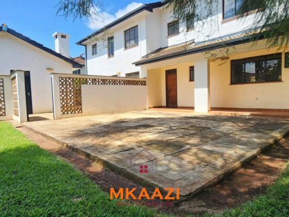Spacious five-bedroom family home for sale on approximately a quarter acre in Mountain View, Nairobi, featuring a landscaped garden, renovated kitchen, fireplaces, and detached two-bedroom DSQ.
