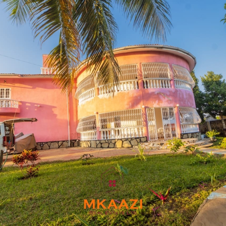 Fully furnished five-bedroom holiday home for sale in Diani on half an acre, featuring a private swimming pool and convenient access to Ukunda and the airstrip.