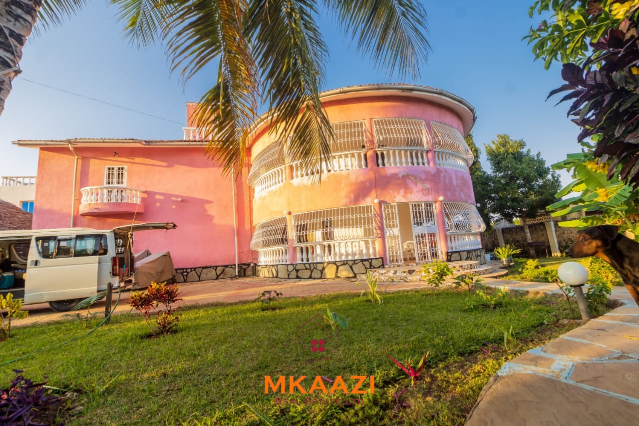 Fully furnished five-bedroom holiday home for sale in Diani on half an acre, featuring a private swimming pool and convenient access to Ukunda and the airstrip.