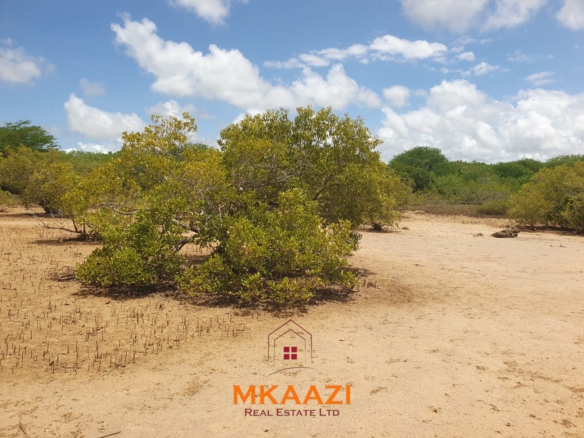 Prime 5.75-acre oceanfront land for sale in Manda Island, Lamu, overlooking Lamu Port and surrounded by scenic coastal and mangrove views.