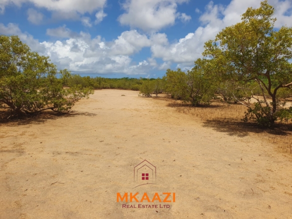 Prime 5.75-acre oceanfront land for sale in Manda Island, Lamu, overlooking Lamu Port and surrounded by scenic coastal and mangrove views.