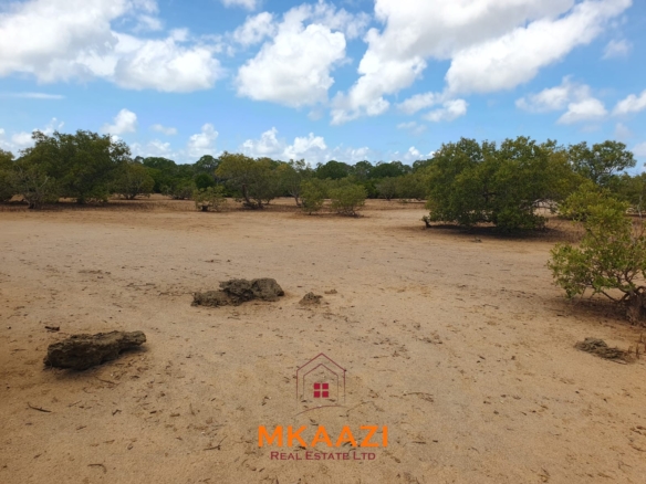 Prime 5.75-acre oceanfront land for sale in Manda Island, Lamu, overlooking Lamu Port and surrounded by scenic coastal and mangrove views.