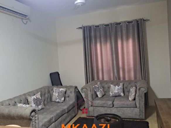Fully furnished 3-bedroom ground-floor apartment for sale at Palm Ridge, Vipingo, featuring two bathrooms, swimming pool, green parks, parking, and 24/7 security.