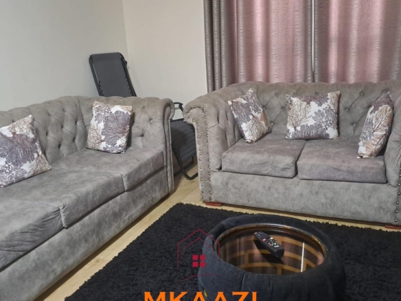 Fully furnished 3-bedroom ground-floor apartment for sale at Palm Ridge, Vipingo, featuring two bathrooms, swimming pool, green parks, parking, and 24/7 security.
