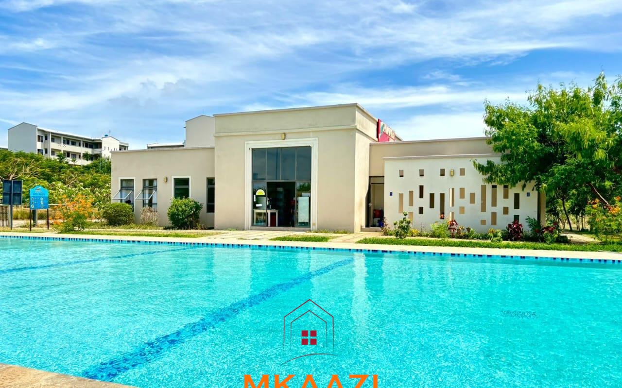 3 Bedroom Furnished Apartment for Sale in Vipingo Fully furnished 3-bedroom ground-floor apartment for sale at Palm Ridge, Vipingo, featuring two bathrooms, swimming pool, green parks, parking, and 24/7 security.