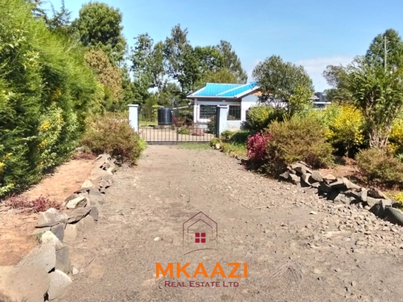 3.5-acre farm for sale in Ol Kalou with a 2-bedroom farmhouse, KPLC electricity, 70-foot fresh-water well and staff quarters.