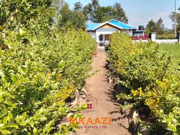3.5-acre farm for sale in Ol Kalou with a 2-bedroom farmhouse, KPLC electricity, 70-foot fresh-water well and staff quarters.
