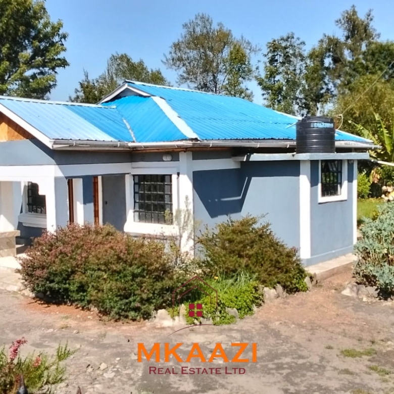 3.5-acre farm for sale in Ol Kalou with a 2-bedroom farmhouse, KPLC electricity, 70-foot fresh-water well and staff quarters.
