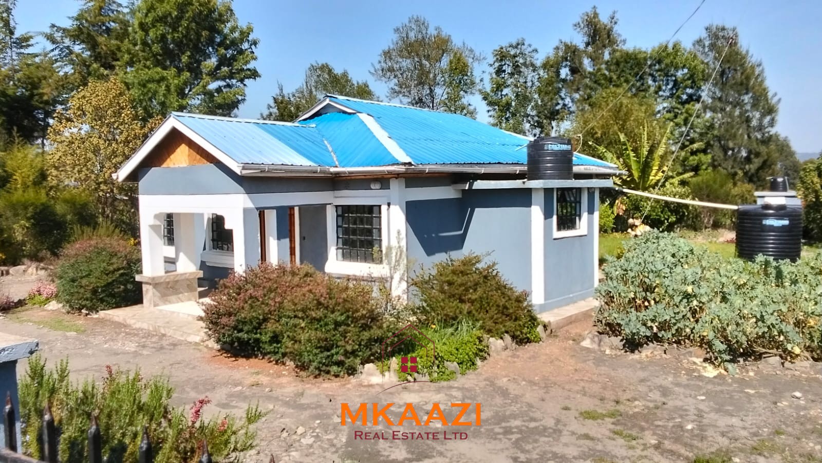 3.5-acre farm for sale in Ol Kalou with a 2-bedroom farmhouse, KPLC electricity, 70-foot fresh-water well and staff quarters.