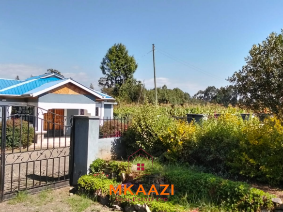 3.5-acre farm for sale in Ol Kalou with a 2-bedroom farmhouse, KPLC electricity, 70-foot fresh-water well and staff quarters.