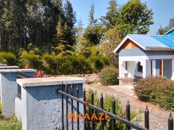 3.5-acre farm for sale in Ol Kalou with a 2-bedroom farmhouse, KPLC electricity, 70-foot fresh-water well and staff quarters.