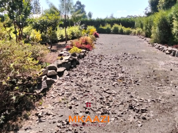 3.5-acre farm for sale in Ol Kalou with a 2-bedroom farmhouse, KPLC electricity, 70-foot fresh-water well and staff quarters.