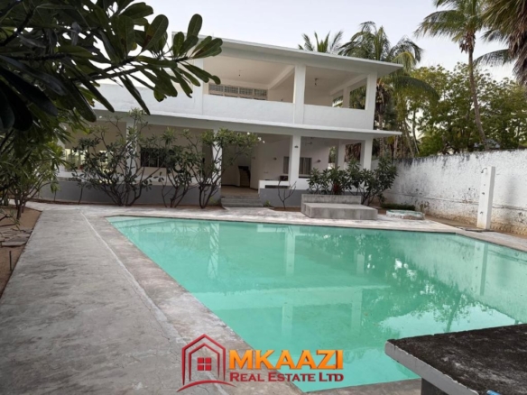 Enjoy a refreshing swim and relax by the private pool during your beachfront stay in Mambrui.